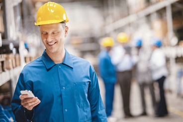 Worker with helmet using a smartphone.

Used firstly in the BOC brochure 